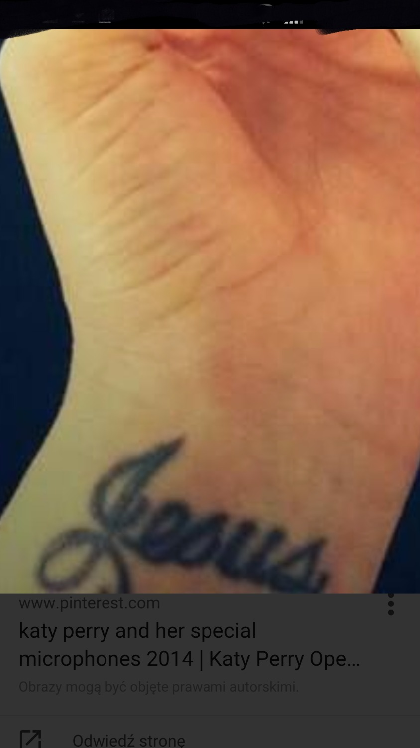 What is the name of this font ? ( Katy Perry tattoo) Font sample to identify the typeface on WhatFontIs