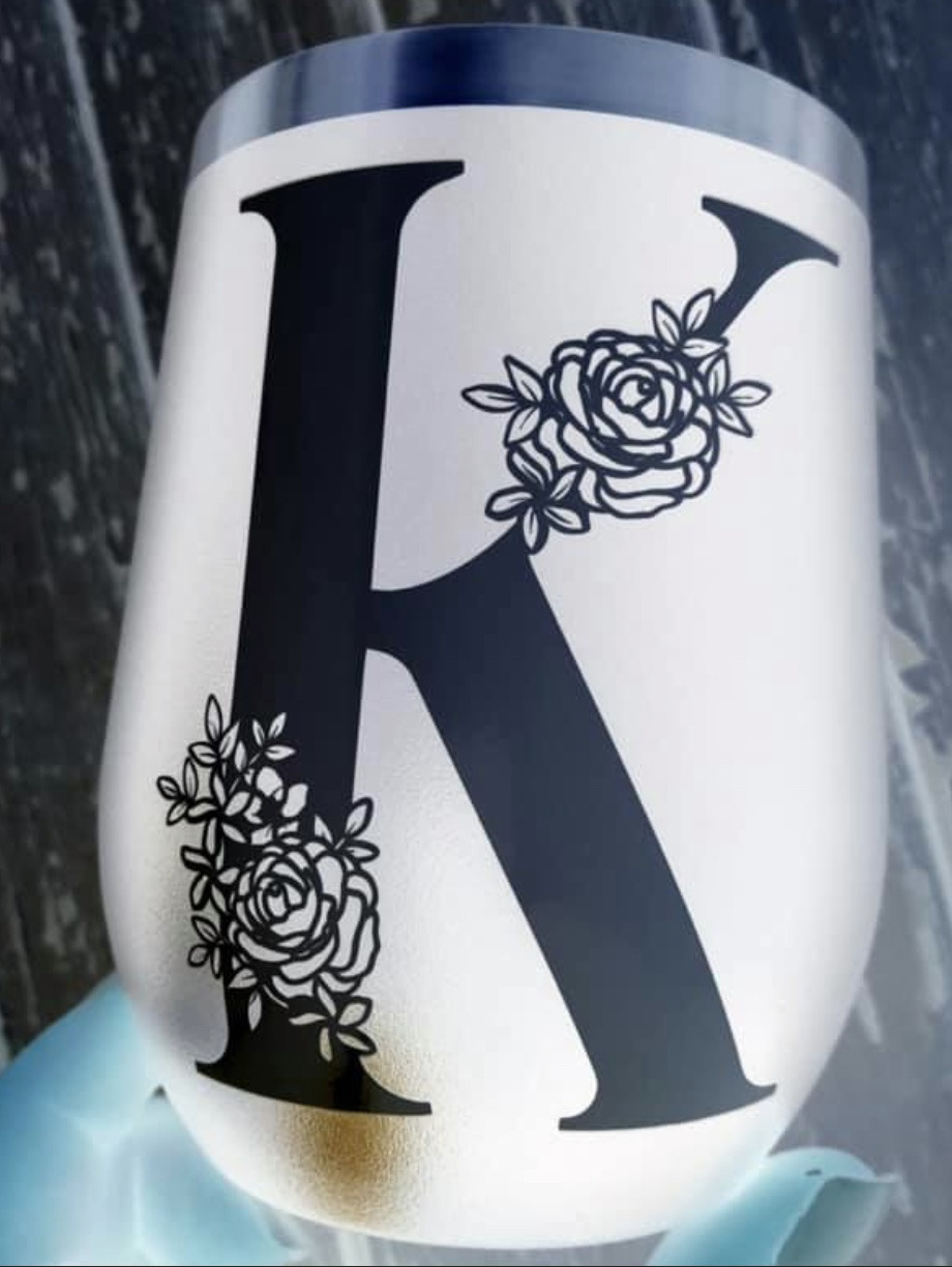 Roses on letters Font sample to identify the typeface on WhatFontIs