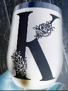 Roses on letters Font sample uploaded by Mariapopp to identify the typeface on WhatFontIs