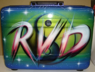 What is the font on the briefcase? (The lettering RVD)