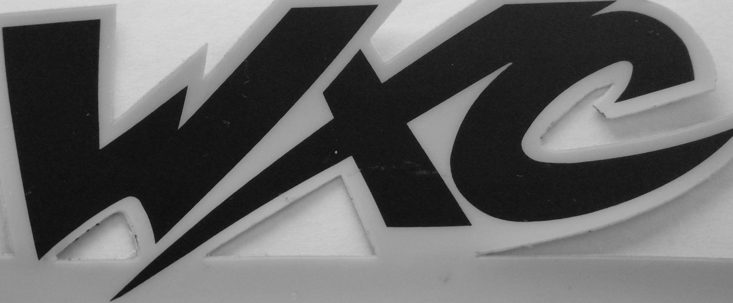 Request Font info for 1992 WXC Husqvarna Motorcycle Font sample to identify the typeface on WhatFontIs