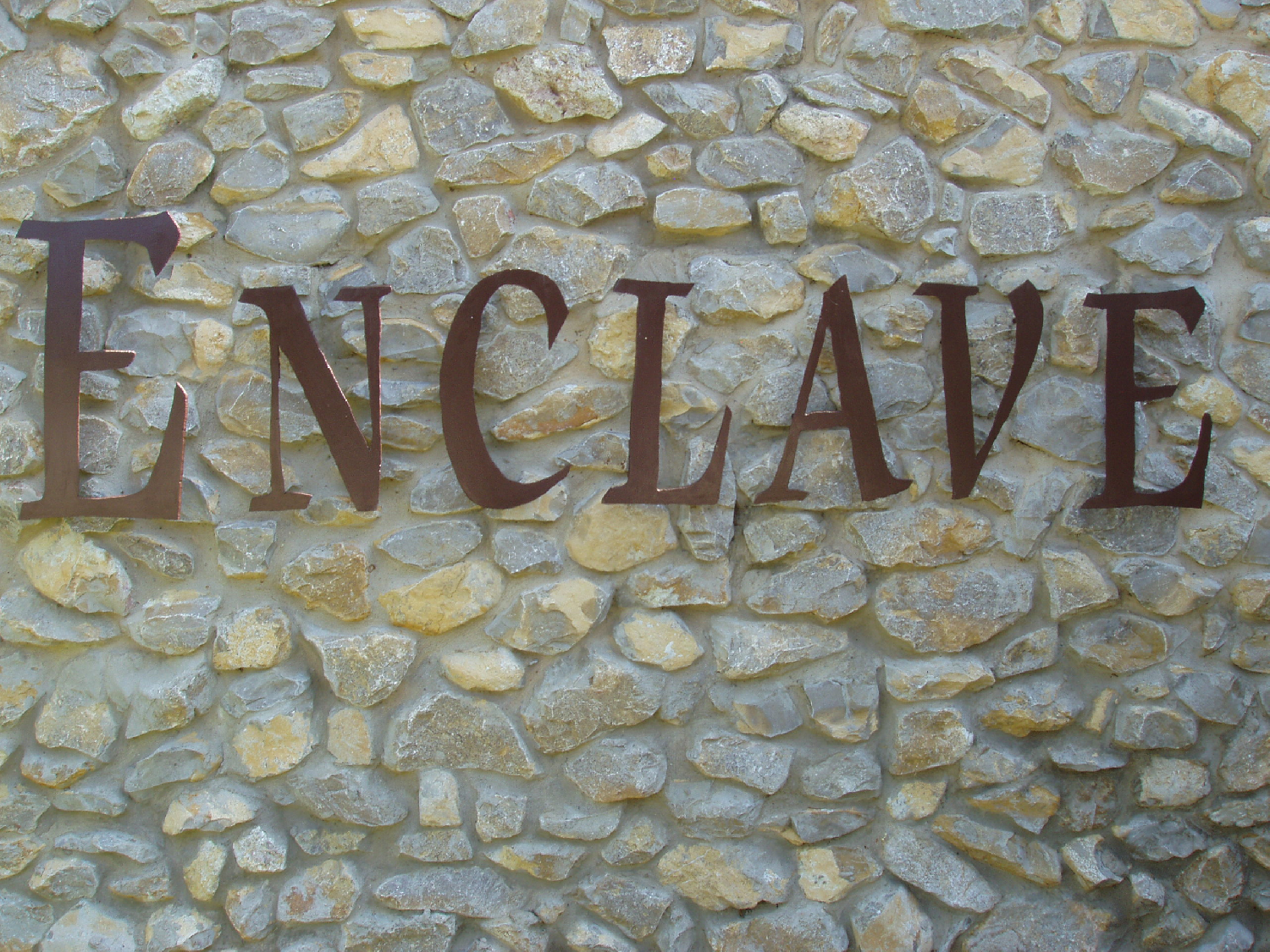 ENCLAVE Font sample to identify the typeface on WhatFontIs