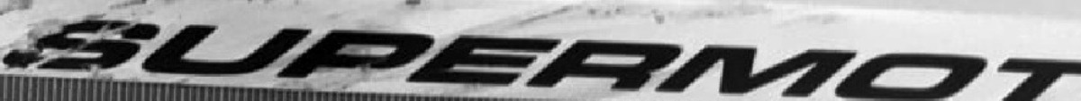 Supermoto KTM Sticker Font sample to identify the typeface on WhatFontIs
